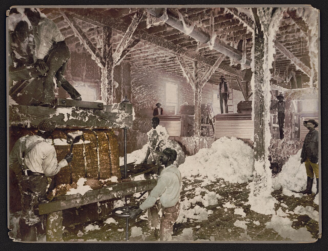 1899 photograph of workers operating a cotton gin in Dahomey, Mississippi