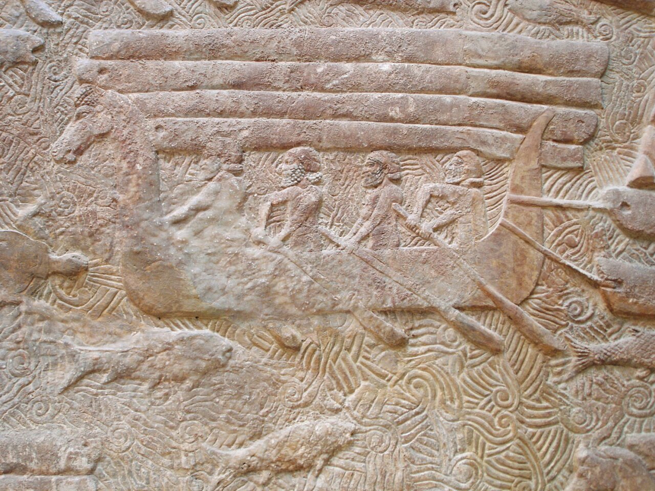 Assyrian relief carving showing a Phoenician ship transporting cedar logs