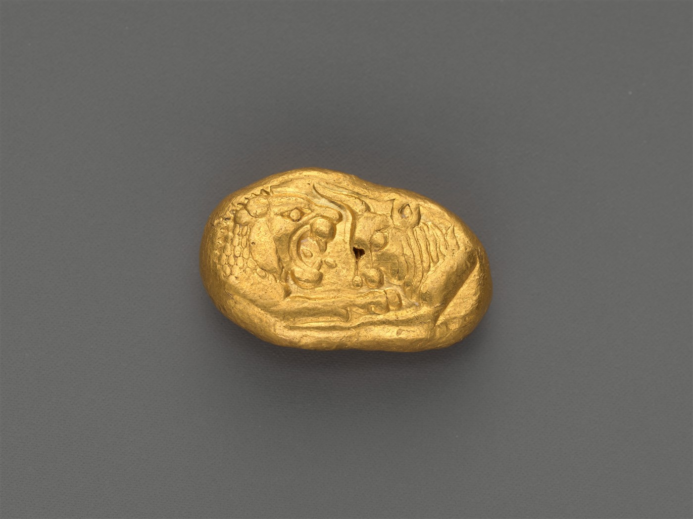 Ancient Lydian gold stater coin, one of the earliest known coined currencies