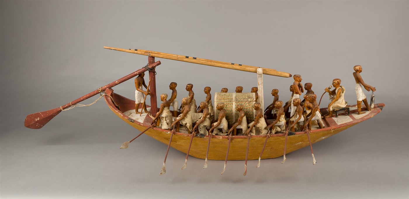 Ancient Egyptian wooden tomb model of a travelling boat being rowed on the Nile